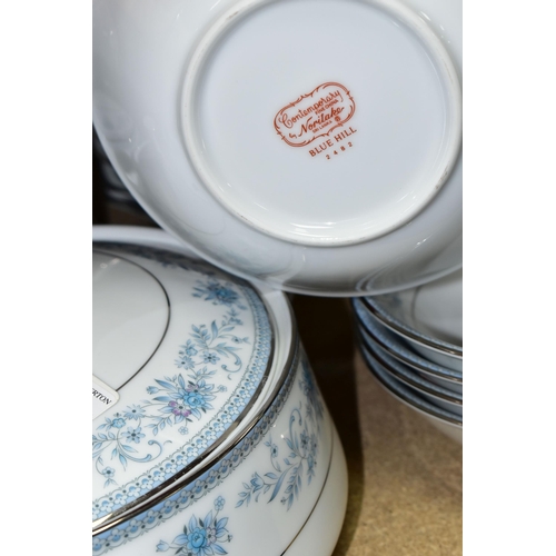 418 - A FIFTY SEVEN PIECE NORITAKE BLUE HILL DINNER SERVICE, pattern no 2482, comprising two tureens, a sa... 