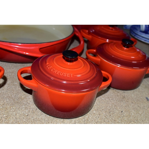 420 - A GROUP OF LE CREUSET COOKWARES, comprising a cast iron round casserole dish with cover, diameter 24... 