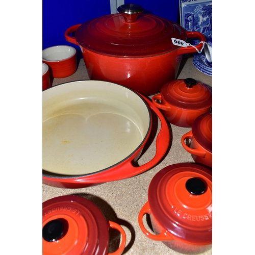 420 - A GROUP OF LE CREUSET COOKWARES, comprising a cast iron round casserole dish with cover, diameter 24... 