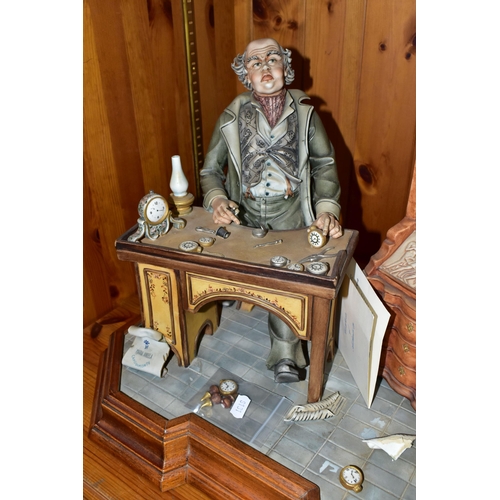 444 - A CAPODIMONTE PORCELAIN TABLEAU 'THE CLOCK MAKER', sculpted by Mario Angela, modelled as a gentleman... 