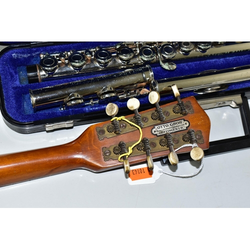 477 - AN OTTO GROH TRAVEL MANDOLIN, an Evette flute with pitted chrome finish and case and a box containin... 