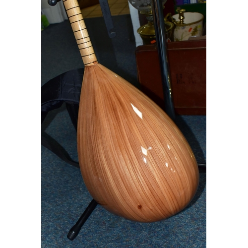 485 - A UNBRANDED TURKISH LONG NECKED BAGLAMA with bowl back, fretwork sound hole to top edge, ebony tunin... 