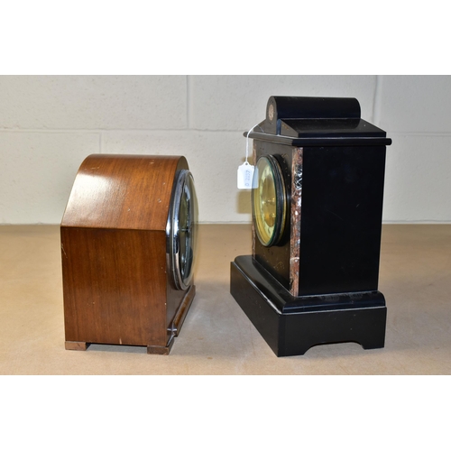 491 - TWO MANTEL CLOCKS, comprising a black slate mantel clock with red marble inserts, engraved foliate d... 