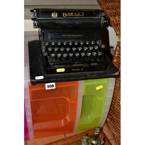 508 - A GROUP OF SUNDRIES, to include a Fortnum & Mason wicker hamper, a vintage Bar-Let Model 2 typewrite... 