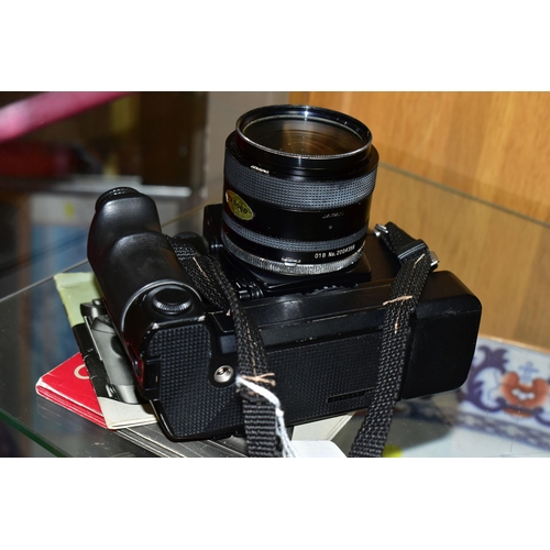 514 - A CONTAX RTS 2 QUARTZ FILM SLR CAMERA with  a W3 motor winder, a Tamron 24mm f2.5 lens and manuals f... 