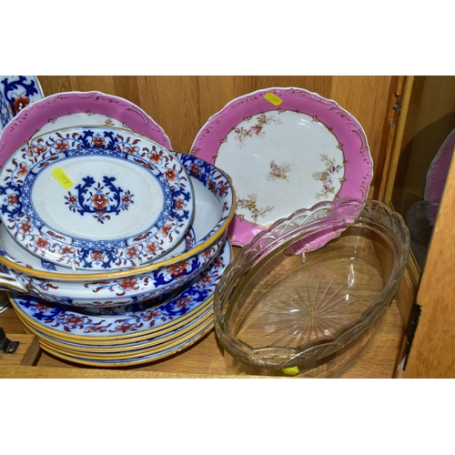 517 - A GROUP OF MINTONS LATE 19TH CENTURY DINNER WARE,  pattern number 8667 blue and red floral border wi... 