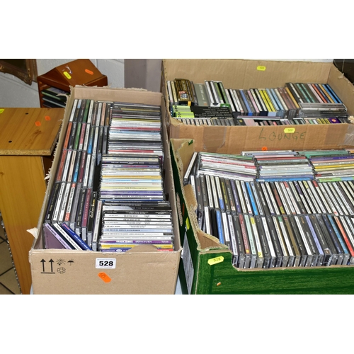 528 - A QUANTITY OF CD'S IN THREE BOXES AND TWO WOODEN STANDS, genres include Classical, Jazz and crooners... 