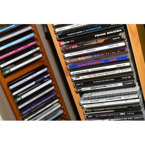 528 - A QUANTITY OF CD'S IN THREE BOXES AND TWO WOODEN STANDS, genres include Classical, Jazz and crooners... 