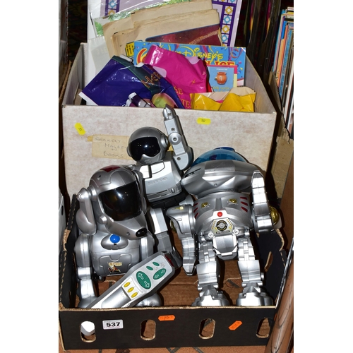 537 - FOUR BOXES OF TOYS AND GAMES ETC, to include battery operated robots, diecast vehicles including a b... 