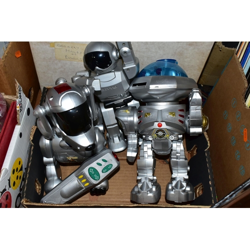 537 - FOUR BOXES OF TOYS AND GAMES ETC, to include battery operated robots, diecast vehicles including a b... 