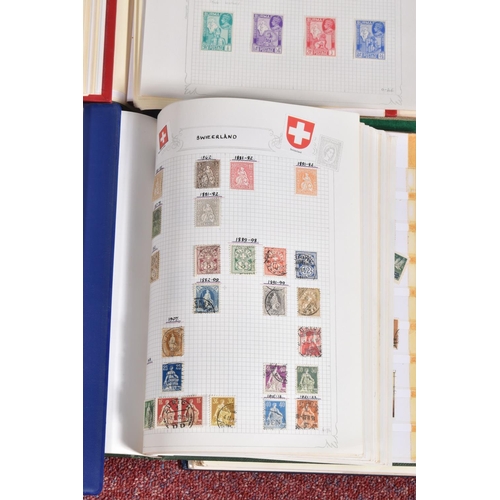 11 - WORLDWIDE COLLECTION OF STAMPS IN SEVEN ALBUMS WITH STRENGTH IN MINT (MOUNTED) GB TO 2009