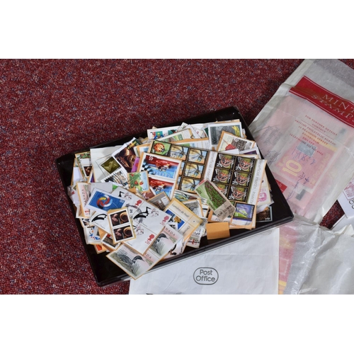 18 - BOX OF LOOSE STAMPS AND ALBUMS, we note a couple of junior type albums with worldwide collections, h... 