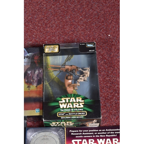 130 - A COLLECTION OF STAR WARS COLLECTABLES, VHS, FIGURES AND GAMES, to include a sealed Star wars Trilog... 