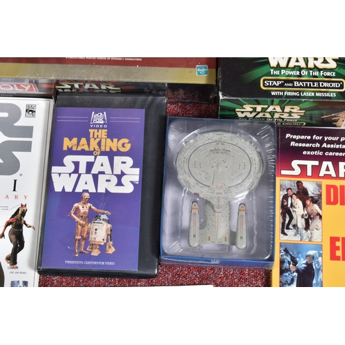 130 - A COLLECTION OF STAR WARS COLLECTABLES, VHS, FIGURES AND GAMES, to include a sealed Star wars Trilog... 