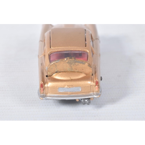 155 - A BOXED CORGI TOYS JAMES BOND ASTON MARTIN D.B.5, No.261, an example of the rarer toffee gold versio... 