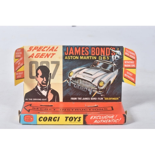 155 - A BOXED CORGI TOYS JAMES BOND ASTON MARTIN D.B.5, No.261, an example of the rarer toffee gold versio... 