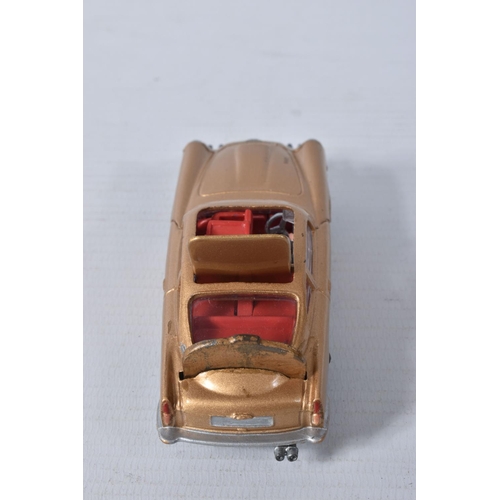 155 - A BOXED CORGI TOYS JAMES BOND ASTON MARTIN D.B.5, No.261, an example of the rarer toffee gold versio... 