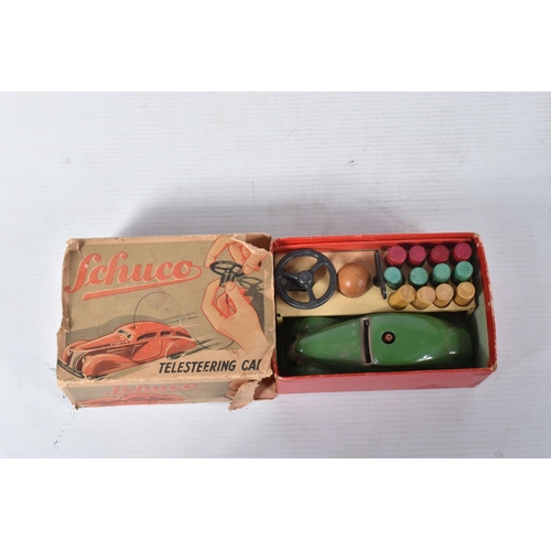 156 - A BOXED SCHUCO 3000 TELESTEERING CAR, version with green car which appears complete and in good cond... 