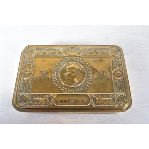 224 - A 1914 PRINCESS MARY TIN, TRENCH ART AND A STEEL HELMET, the tin is in very good condition for its a... 