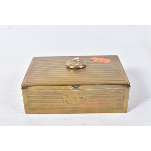 226 - A WINSTON CHURCHILL BISCUIT TIN, containing a hallmarked silver cigarette holder, a cased set of bin... 