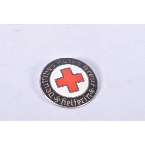 232 - TWO GERMAN RED CROSS BADGES, one is marked of the rear Ges Gesh ST&L and weighs approximately 9.9g, ... 