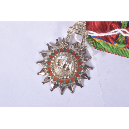 233 - A THAILAND ORDER OF THE WHITE ELEPHANT MEDAL, with ribbon rosette, this award is 5th class and comes... 