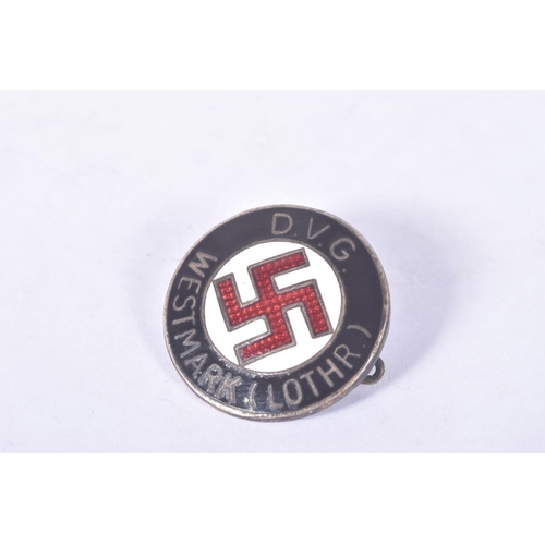 235 - TWO GERMAN PIN BADGES, to include an NSDAP Nazi Party DVG Westmark (LOTHR) badge, and a HEIM INS REI... 