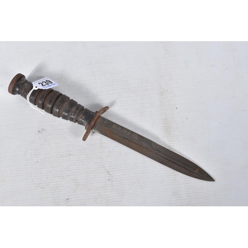 239 - A US ARMY FIGHTING KNIFE, the blade is clearly marked 'U.S.M3 PAL' but has no date, the scabbard and... 