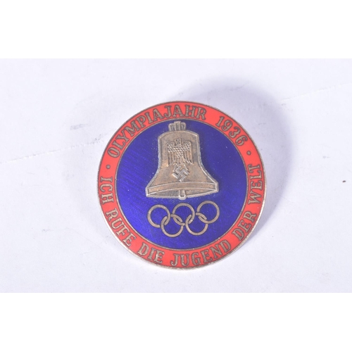 255 - THREE BERLIN OLYMPIC BADGES TO INCLUDE A VISITORS BADGE with white enamel and five coloured rings, a... 