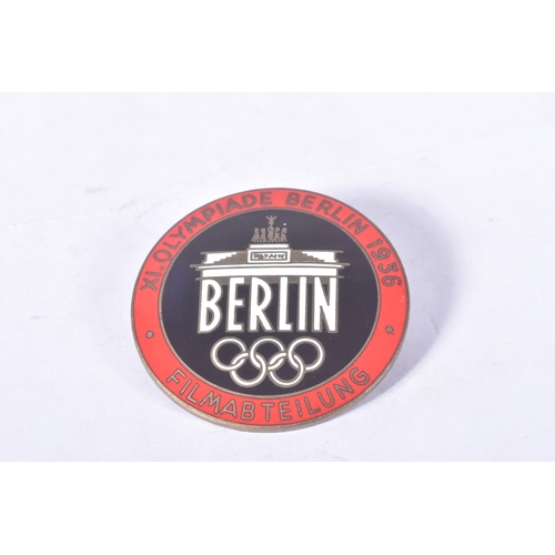 256 - TWO 1936 BERLIN OLYMPIC BADGES, these are from both summer and winter games, the first is red and bl... 