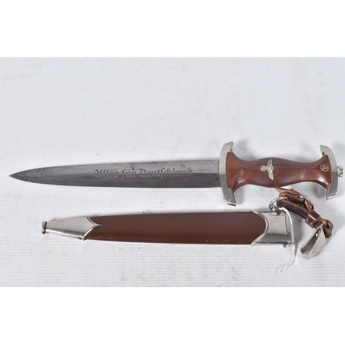 264 - A WWII ERA GERMAN SA DAGGER, this dagger is complete with its original scabbard and has the maker ma... 