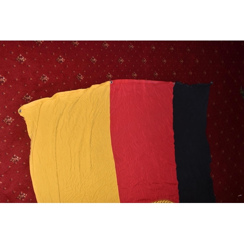 285 - TWO EAST GERMAN DDR FLAGS AND A BANNER, these all vary in size, the banner is in good condition and ... 