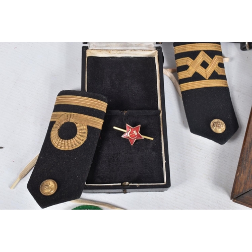 348 - A BOX OF MILITARIA, to include a believed to be period family memorial of a German Iron Cross in a f... 