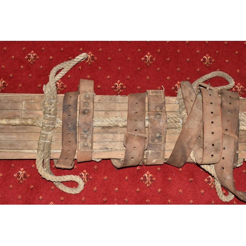 363 - A WW1/2 ERA MILITARY EXTRICATION STRETCHER, wood/canvas construction, has many fastening securing po... 