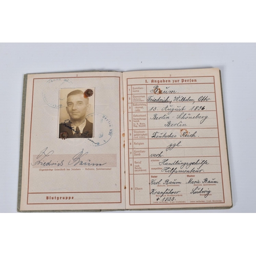 304 - FRIEDRICH BAUM, CONCENTRATION CAMP GUARD WHERPASS, DOB 13/08/1896, place Berlin, includes passbook, ... 