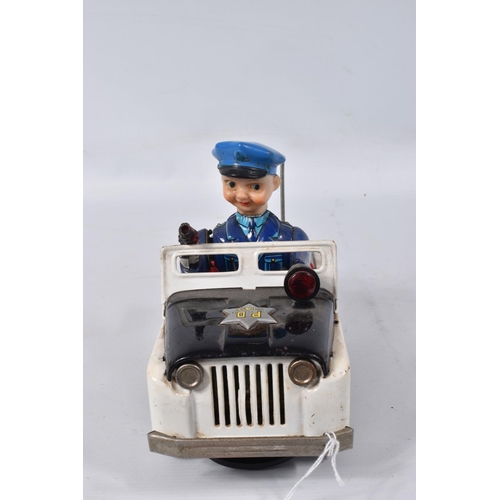 34 - A BOXED NOMURA TN TOYS BATTERY OPERATED TINPLATE STICK SHIFT POLICE JEEP, No.7507, not tested, appea... 