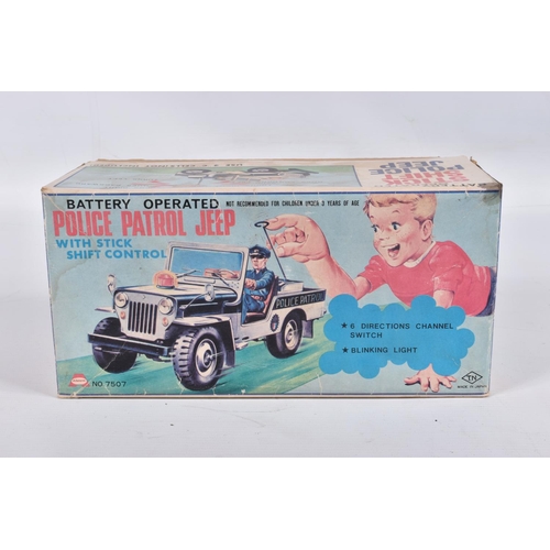 34 - A BOXED NOMURA TN TOYS BATTERY OPERATED TINPLATE STICK SHIFT POLICE JEEP, No.7507, not tested, appea... 