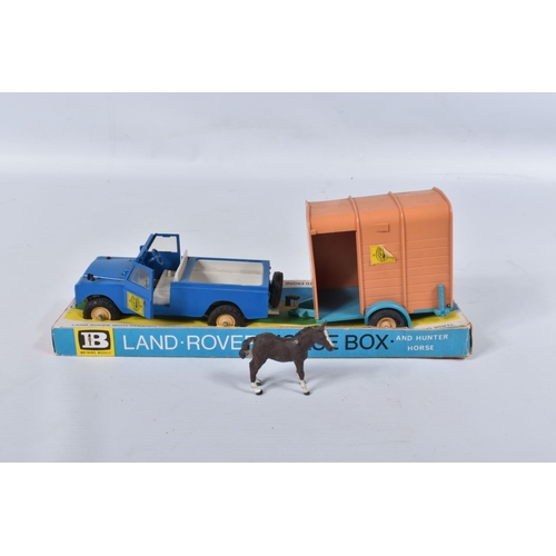 36 - A BOXED BRITAINS LAND ROVER, HORSE BOX AND HUNTER HORSE, No.9575, playworn condition with some paint... 