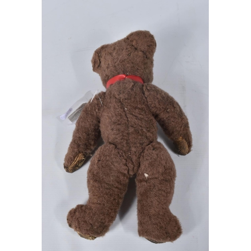 38 - A BROWN WOOL TEDDY BEAR, c. 1950's possibly British or Australian, amber and black glass eyes, shave... 