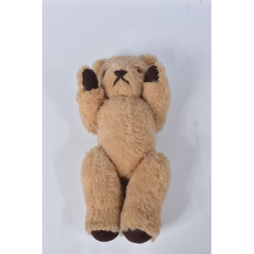 38 - A BROWN WOOL TEDDY BEAR, c. 1950's possibly British or Australian, amber and black glass eyes, shave... 