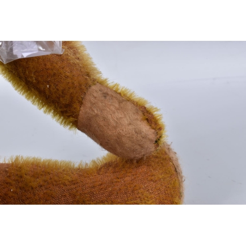 39 - AN AMERICAN ORANGE BRISTLE MOHAIR TEDDY BEAR, c.1914 - 1920, replacement glass eyes, horizontal stit... 