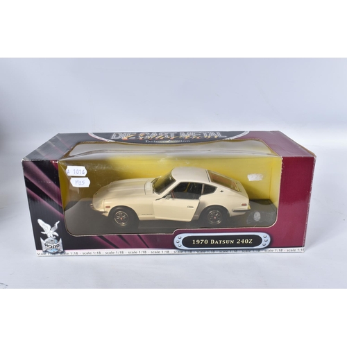 44 - A COLLECTION OF ASSORTED BOXED 1:18 SCALE DIECAST SPORTS CAR MODELS, assorted models of British, Ame... 