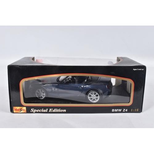 53 - A COLLECTION OF ASSORTED BOXED 1:18 SCALE DIECAST SPORTS CAR MODELS, assorted models of German and I... 