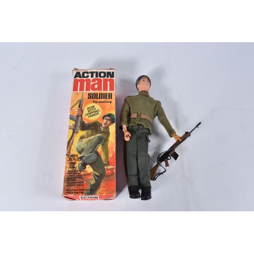 54 - A BOXED PALITOY ACTION MAN SOLDIER FIGURE, No.34052, figure with fair flock hair and gripping hands ... 