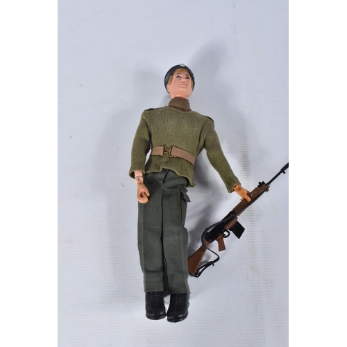 54 - A BOXED PALITOY ACTION MAN SOLDIER FIGURE, No.34052, figure with fair flock hair and gripping hands ... 