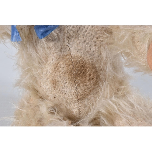 66 - A FARNELL ALPHA TYPE WHITE MOHAIR TEDDY BEAR, c.1930's, original amber and black glass eyes, horizon... 