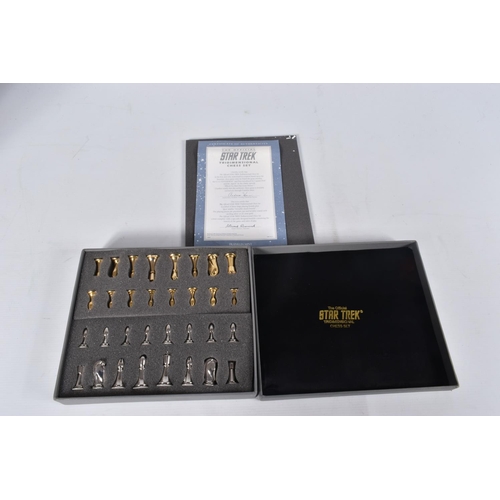 74 - A BOXED FRANKLIN MINT STAR TREK TRIDIMENSIONAL CHESS SET, c.1994, appears complete with all the ster... 