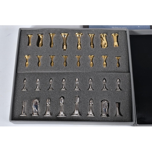 74 - A BOXED FRANKLIN MINT STAR TREK TRIDIMENSIONAL CHESS SET, c.1994, appears complete with all the ster... 