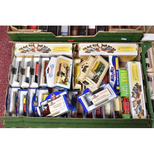 79 - A QUANTITY OF BOXED AND UNBOXED MODERN DIECAST VEHICLES, to include Lledo 'Days Gone', 'Promotors', ... 