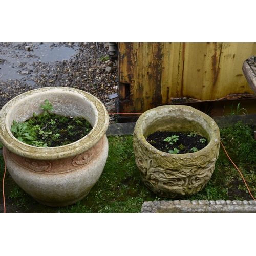 1003 - FOUR MODERN COMPOSITE GARDEN PLANTERS including a square planter with foliate details to each side h... 